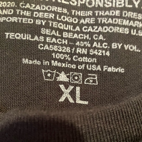 Stand out in our black tee featuring bold sugar skulls. Comfy and stylish - Picture 3 of 3